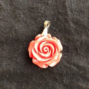 Carved rose pendant